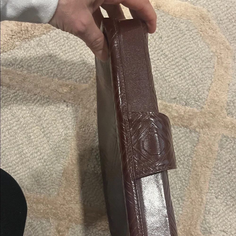 Elegant Maroon Clutch with Geometric Pattern